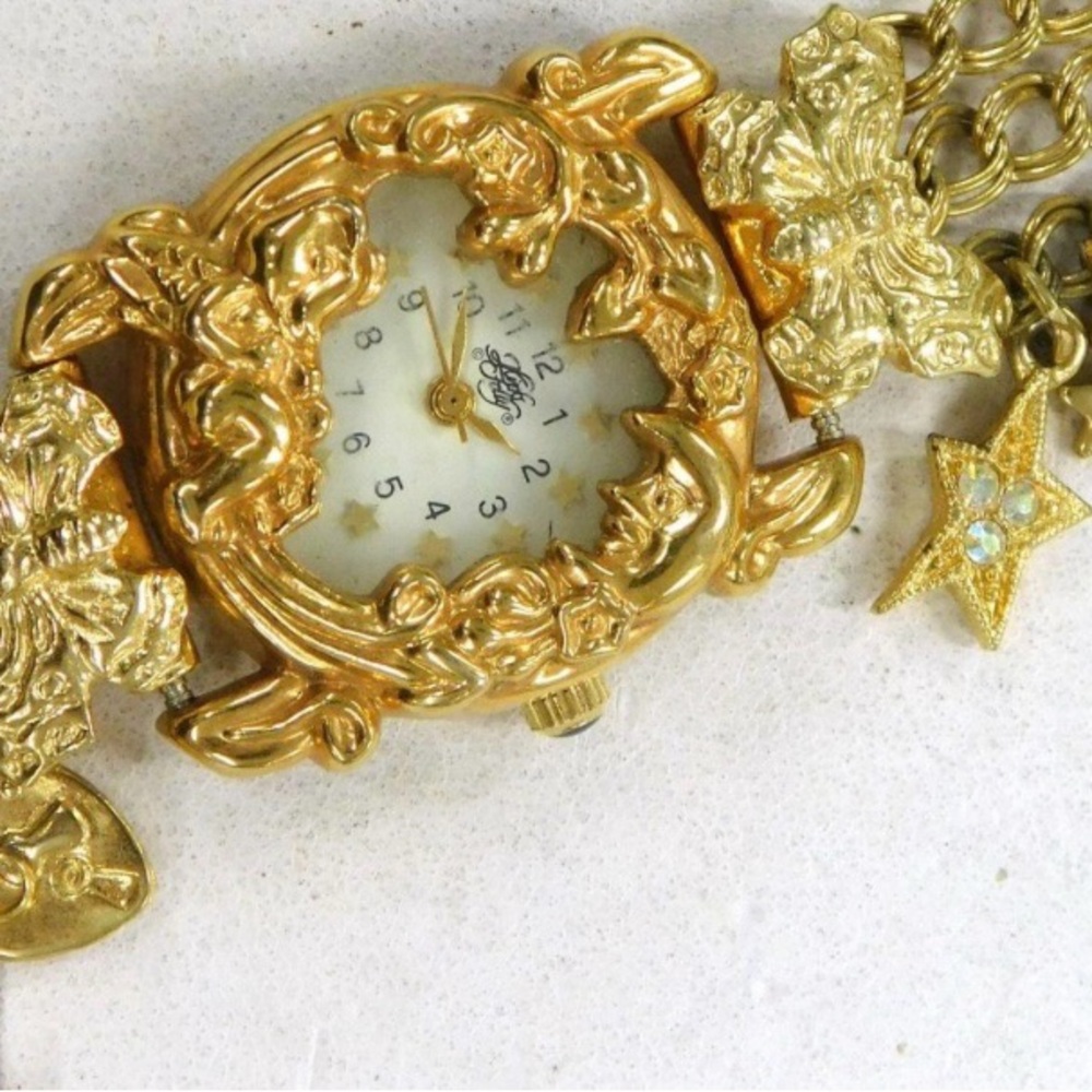 RARE Kirks Folly charm bracelet watch